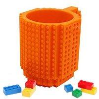 build on creative brick mug with external pieces orange