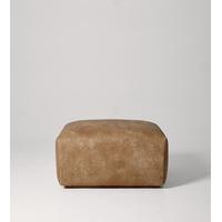 budapest ottoman in tan leather dark feet