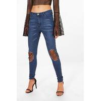 busted knee fishnet skinny jeans dark blue