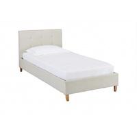 castel fabric bed in neutral cream