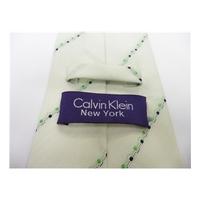 Calvin Klein Silk Tie In Cream With Diagonal Green and Black Dots