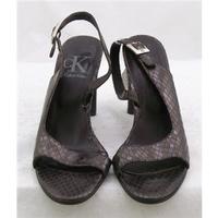 Calvin Klein, size 5 brown snake skin sandals
