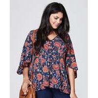CAPE BACK FLORAL TOP