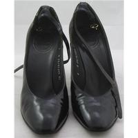 Christian Dior, size 5.5 black leather high heeled shoes with ankle strap