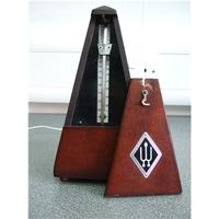 Classic wooden metronome