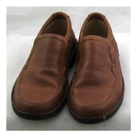 Clarks, size 7.5 tan leather slip on shoes