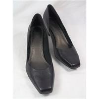 Clarks, size 7 black leather court shoes