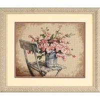 counted cross stitch roses on white chair by dimensions 375080