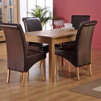 Corrick Dining Table And 4 Black Faux Leather Dining Chairs