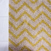 contemporary yellow beige chevron shaggy rug helsinki 120x170cm