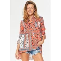 courtney orange printed dip hem shirt