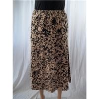 cotswold collection large pink and black patterned skirt