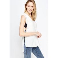 contrast side white dip hem top