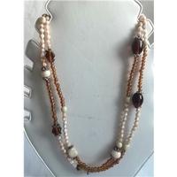 Cream And Brown Long Beaded Necklace