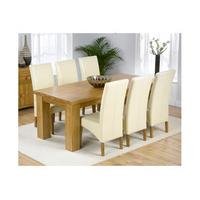 daniela solid oak dining table and 6 leather chairs in cream