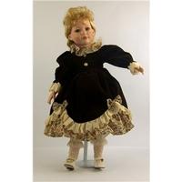 Decorative Porcelain Doll in Brown Dress