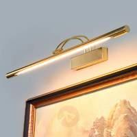 Delicate PIKTURA picture light, glossy brass