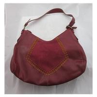 Deep red leather look handbag