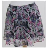Divided, Size 14 purple mix floral patterned mini skirt
