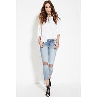 distressed low rise jeans