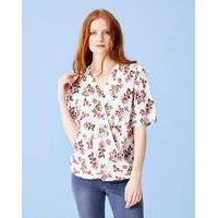 ditsy print short sleeve wrap blouse