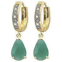 diamond and emerald droplet huggie earrings in 9ct gold