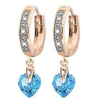 diamond and blue topaz earrings in 9ct rose gold