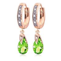 diamond and peridot droplet huggie earrings in 9ct rose gold