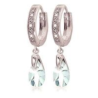 diamond and aquamarine droplet huggie earrings in 9ct white gold