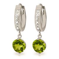 diamond and peridot huggie earrings in 9ct white gold