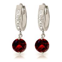 diamond and garnet huggie earrings in 9ct white gold