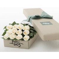 dozen white roses in a gift box