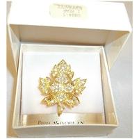 D`Orlan gold coloured and crystal brooch