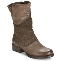 dream in green womens mid boots in brown