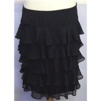 editions size 10 black knee length skirt