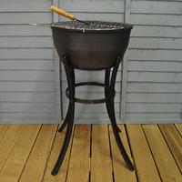 elidir cast iron fire bowl bbq grill with long legs by gardeco