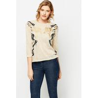 embroidered knit top