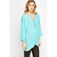 Embellished Neck Asymmetric Top