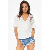 Erica White Embroidered Ruffle Hem Top