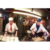 Evening Street Food Hopping Tour in Downtown Osaka