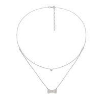 FASHIONABLY SILVER BOW NECKLACE