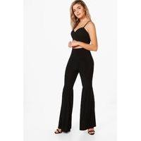 flared knee slinky trousers black