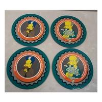 Four Matt GRDening coasters