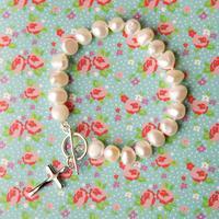 Freeform Pearl Bracelet With A Cross