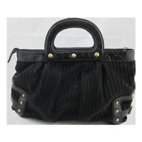 Geo Comp black faux fur handbag