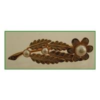 Gilt brooch - with faux pearls