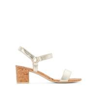 gold coloured sandals with cork effect heel