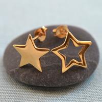 gold star stud earrings mismatched