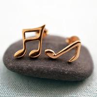 gold music note stud earrings mismatched