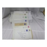 GROUP OF STAMPS ON ORIGINAL ENVE...